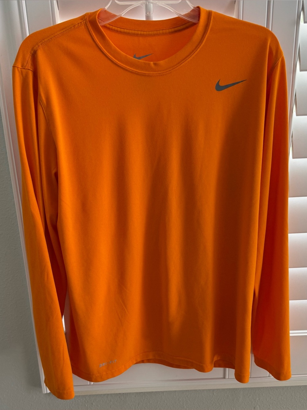 Men’s orange “The Nike Tee” long sleeve dri fit Medium athletic running shirt
